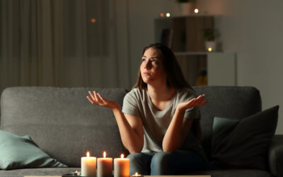 What should I do if I experience an electrical outage or power surge?